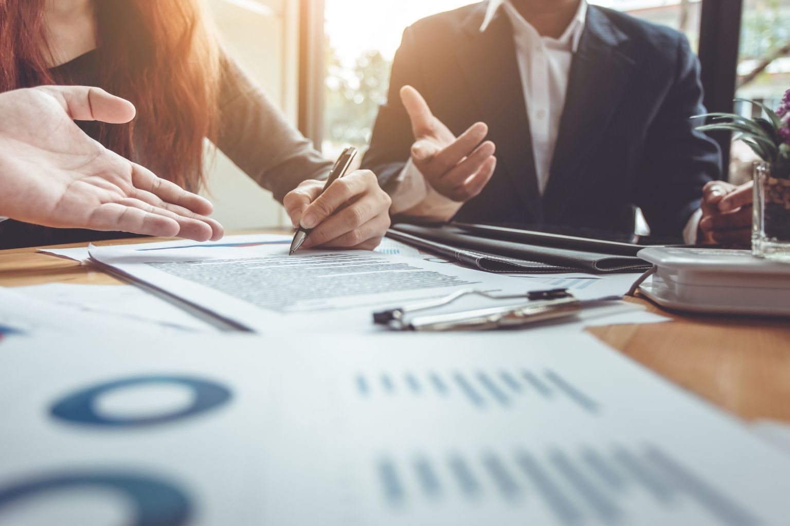 Business Signing a Contract Buy – sell house.